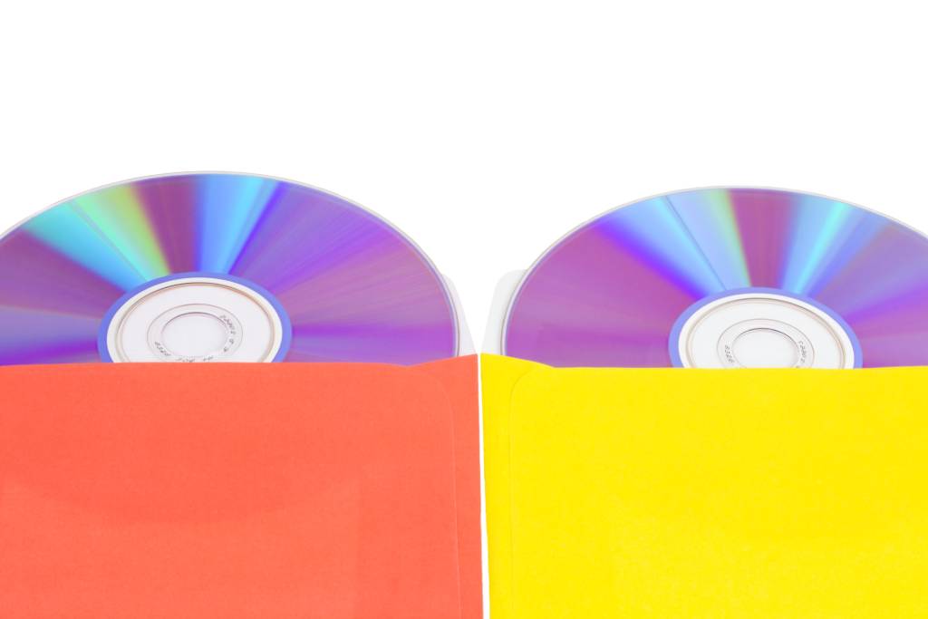 Two CDs in bright colored sleeves