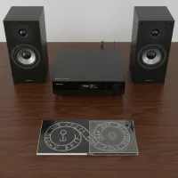 4 Panel Digipak on a table with CD player and speakers